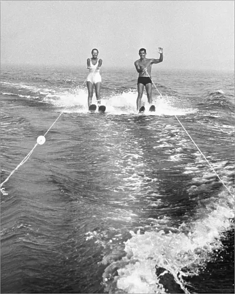 Couple water skiing