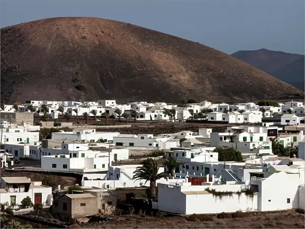 White buildings, volcanoes at the back, Uga, Lanzarote, Canary Islands, Spain