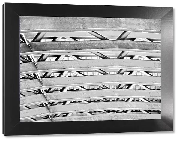 Overhead. A black and white photograph of a metal overhang in Downtown Seattle, Washington