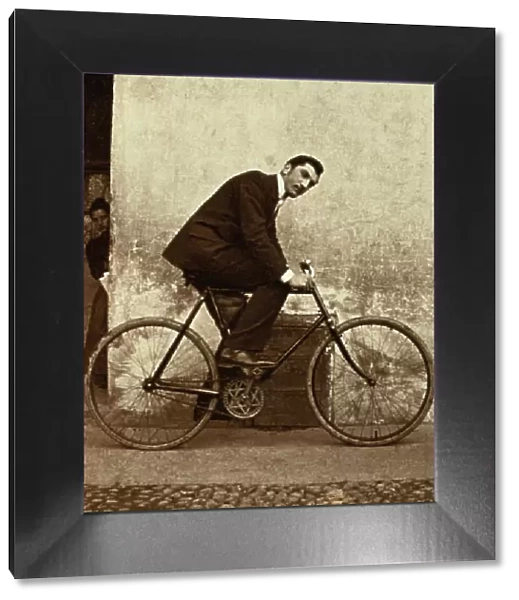 Man on Antique Bicycle