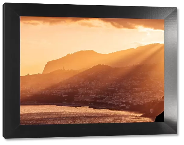 Funchal city skyline and Madeira island landscape at sunset, Portugal