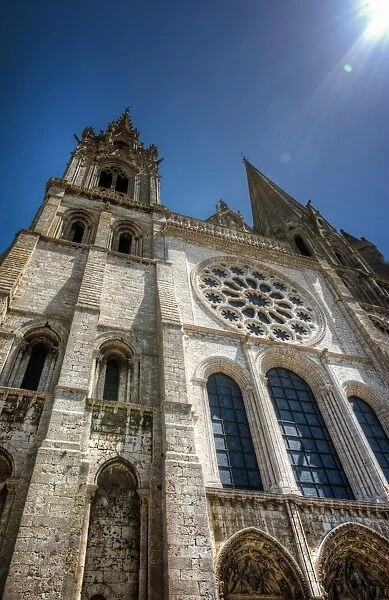 Chartres cathedral facade under blue sky