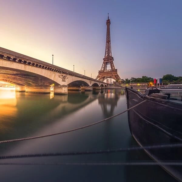 Eiffel tower with reflection at Seine river