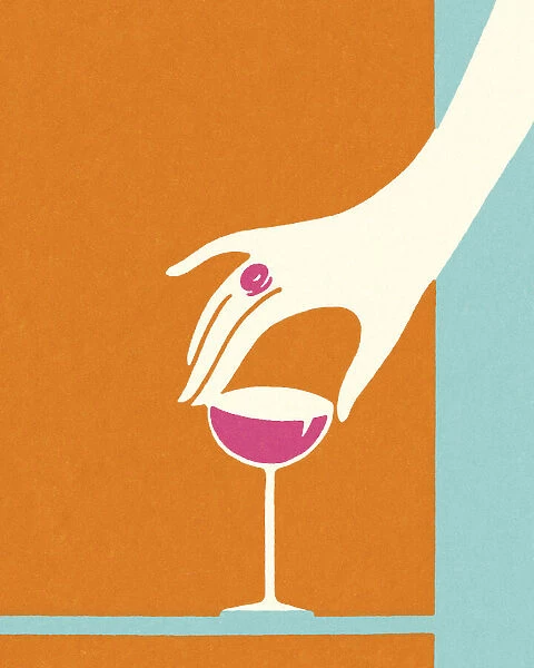 Hand Reaching for a Wineglass