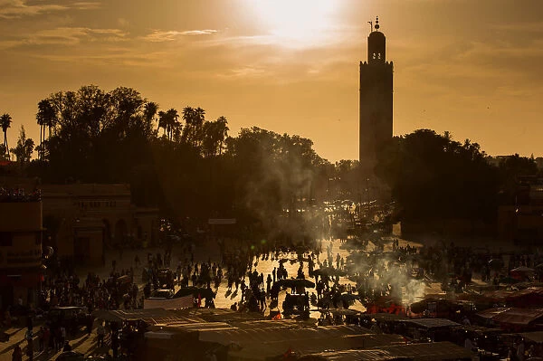 Jamaa el Fna (also Jemaa el-Fnaa, Djema el-Fna or Djemaa el-Fnaa) is a square and market place in Marrakeshs medina quarter (old city) with Koutubia in background. Marrakesh, Morocco, north Africa. n