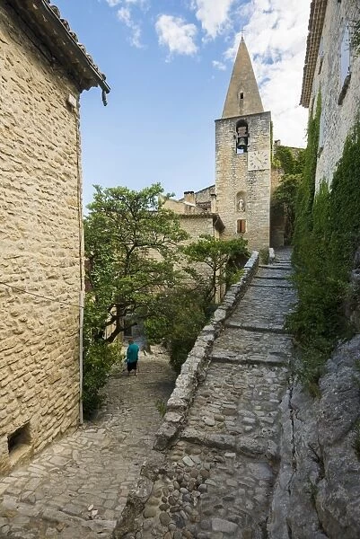 Medieval alley and spire, Crestet, Vaucluse, Provence-Alpes-Cote dAzur, France