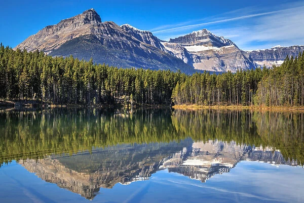 Rocky Mountains Reflected In Herbert Lake, Banff National Park, Alberta, Canada