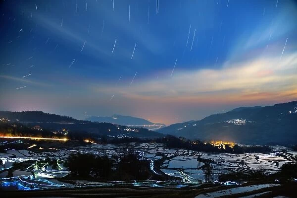 Star trails over Yuanyang rice terrace, China