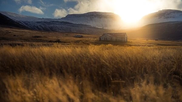 sunrise through mountain range in Iceland