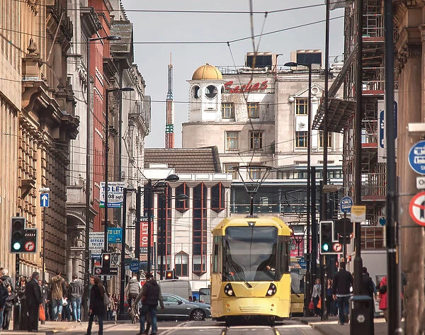A tram leaving Piccadilly Gardens, Manchester