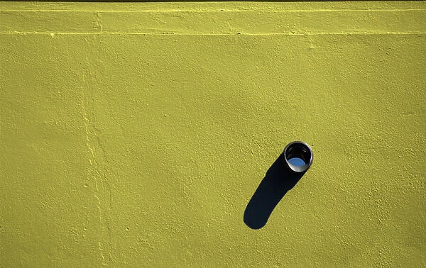 Yellow Wall With Rain Spout