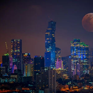 Bloody moon Bangkok night view with skyscrape