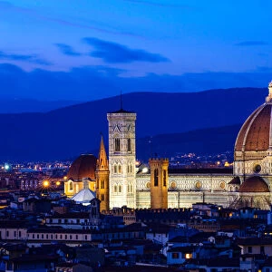 The Duomo (Cathedral of Santa Maria del Fiore) Rising Above the City at Night