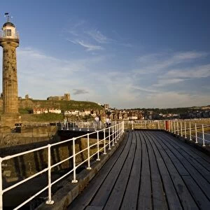 England, North Yorkshire, Whitby, pier and lighthouse