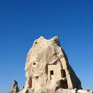 Fairy Chimney rock house built in volcanic tuft rock, Love Valley, Goreme National Park, Cappadocia, Nevsehir Province, Central Anatolia Region, Turkey