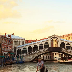 Gondolier near Rialto bridge, Venice, Italy