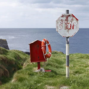 Life ring and stop sign, Three Castle Head, Mizen Head Peninsula, West Cork, Republic of Ireland, British Isles, Europe