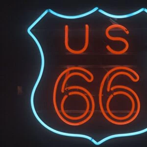 A neon sign that reads ?US 66?