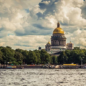 Panoramic view of Saint Isaacs Cathedral in green Saint Petersburg city, Russia