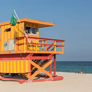 Red and orange lifeguard tower at Miami Beach