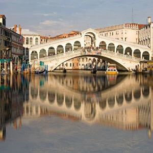Reflection of Rialto Bridge in Grand Canal of Venice