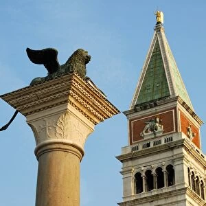 San Marco clocktower, column of the lion of Saint Mark, Piazzetta, Venice Italy