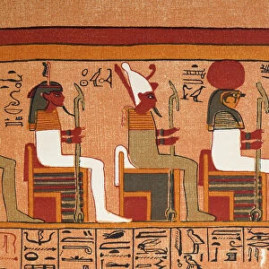 Seated Ancient Egpytian Gods, including the hawk head Horus god of kingship and the sky