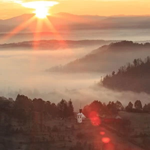 Sunrise above valley, Targu Lapus, Maramures County, Transylvania, Romania