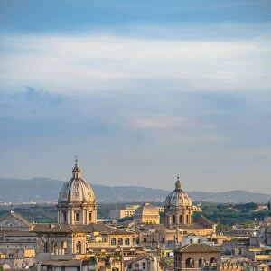 View of the old town and cupolas at sunset. Rome, Italy