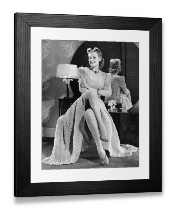 Framed Print : Woman in dress showing stockinged legs Framed Print : Woman in dress showing stockinged legs