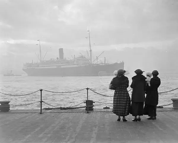 Laconia. Three ladies watch the second Cunard liner to be named Laconia