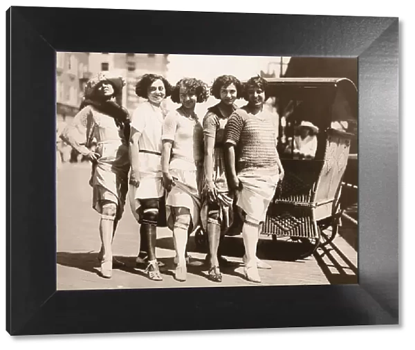 Line of Women Showing their Garter Belts  /  Circa 1920 s
