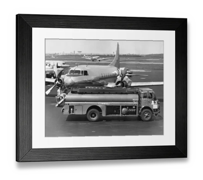 Framed Print : Airplane being fueled