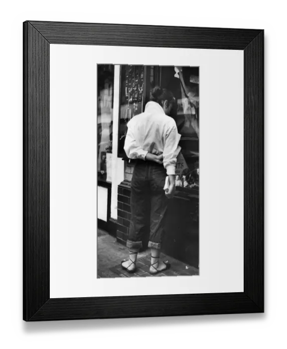 Framed Print : Street Fashion 1953; fashionable young woman window shopping in Londons Piccadilly Framed Print : Street Fashion 1953; fashionable young woman window shopping in Londons Piccadilly