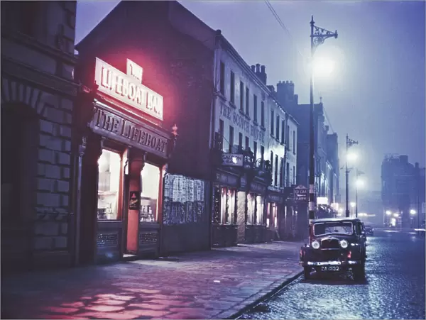 A night-time view of the Lifeboat Bar in Dublin