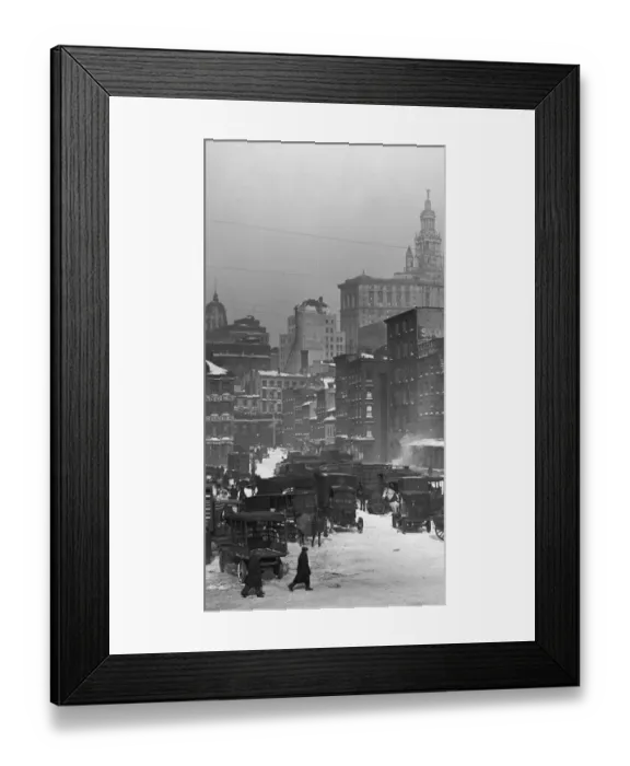 Framed Print : circa 1925: A view of a group of automobiles and wagons parked in the snow Framed Print : circa 1925: A view of a group of automobiles and wagons parked in the snow