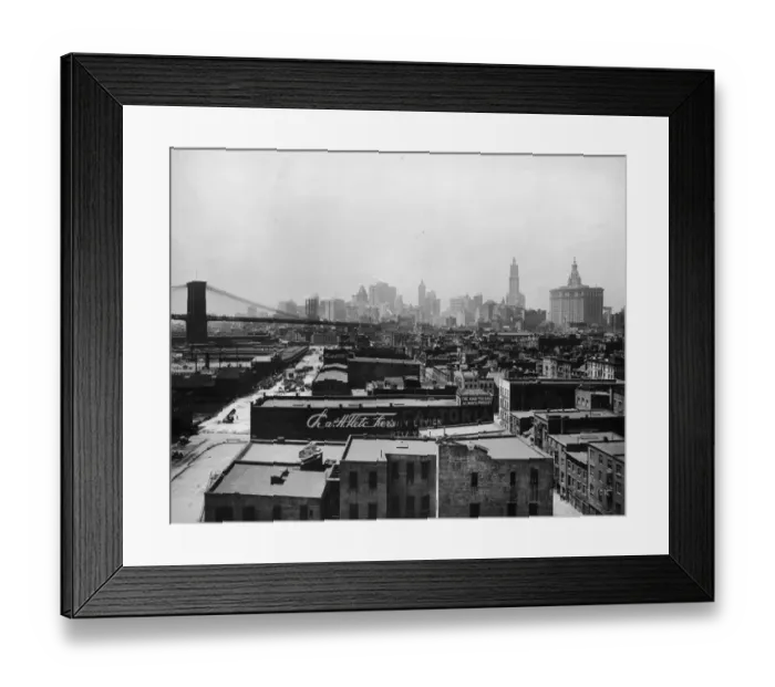 Framed Print : circa 1920: View of the buildings at South Street Seaport and the Brooklyn Bridge Framed Print : circa 1920: View of the buildings at South Street Seaport and the Brooklyn Bridge