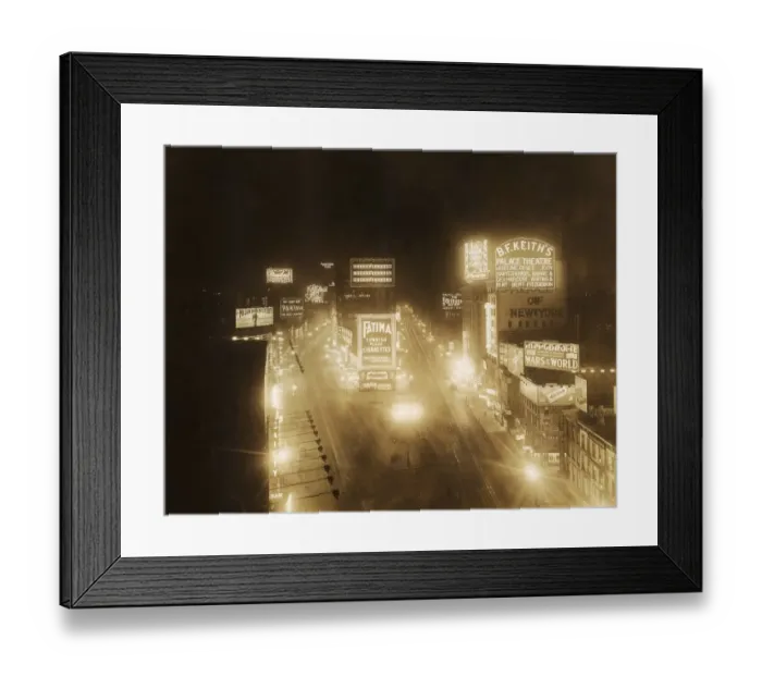 Framed Print : circa 1920: High-angle view of illuminated marquees in Times Square at night Framed Print : circa 1920: High-angle view of illuminated marquees in Times Square at night