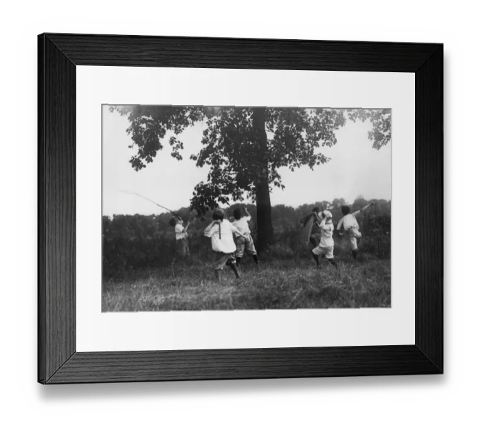 Framed Print : Stuck Up A Tree; boys throwing sticks in an attempt to bring an object down Framed Print : Stuck Up A Tree; boys throwing sticks in an attempt to bring an object down