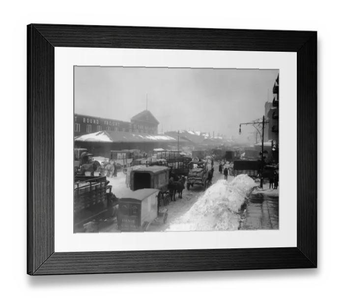 Framed Print : Railroad Snow; Horsedrawn carts crowd the intersection of West and Chambers Streets