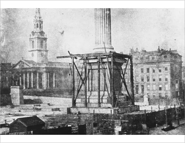 No Lions. circa 1843: Trafalgar Square, the base of Nelsons column surrounded