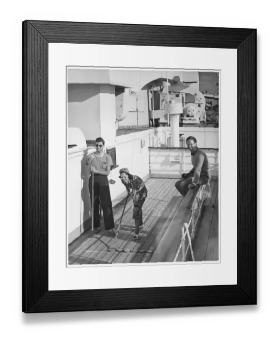 Framed Print : Woman and two men on cruiser deck, (B&W), elevated view Framed Print : Woman and two men on cruiser deck, (B&W), elevated view