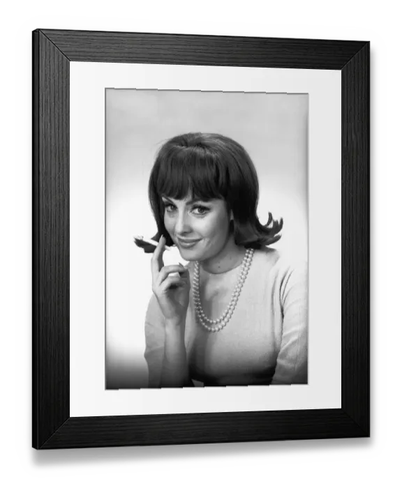 Framed Print : Woman with cigarette posing in studio, (B&W), portrait Framed Print : Woman with cigarette posing in studio, (B&W), portrait