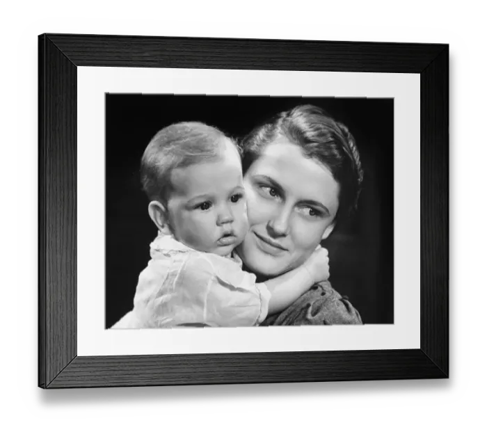 Framed Print : Mother with baby girl (9-12 months) posing in studio, (B&W), portrait