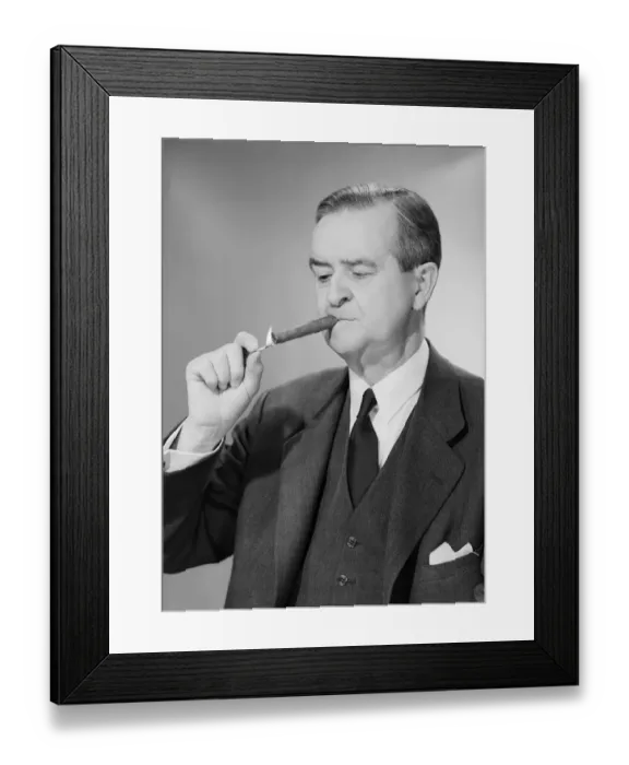 Framed Print : Mature man lighting cigar Framed Print : Mature man lighting cigar