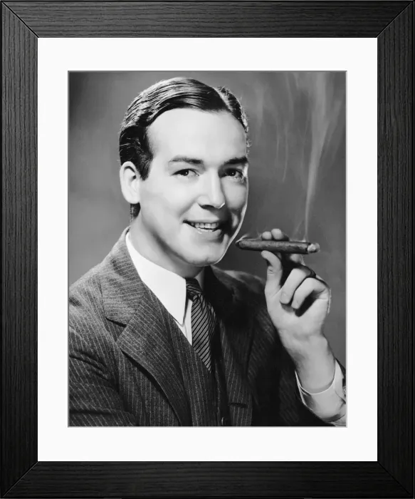 Framed Print : Executive smoking cigar Framed Print : Executive smoking cigar