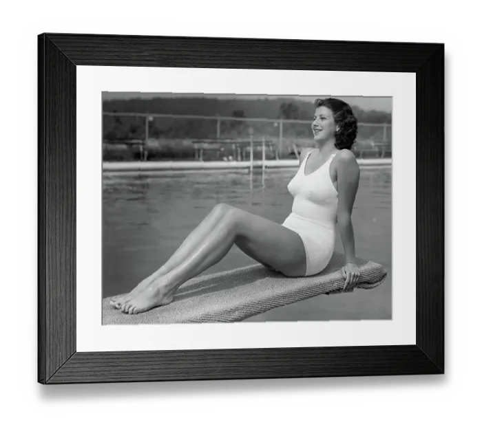 Framed Print : Woman sitting on divingboard Framed Print : Woman sitting on divingboard