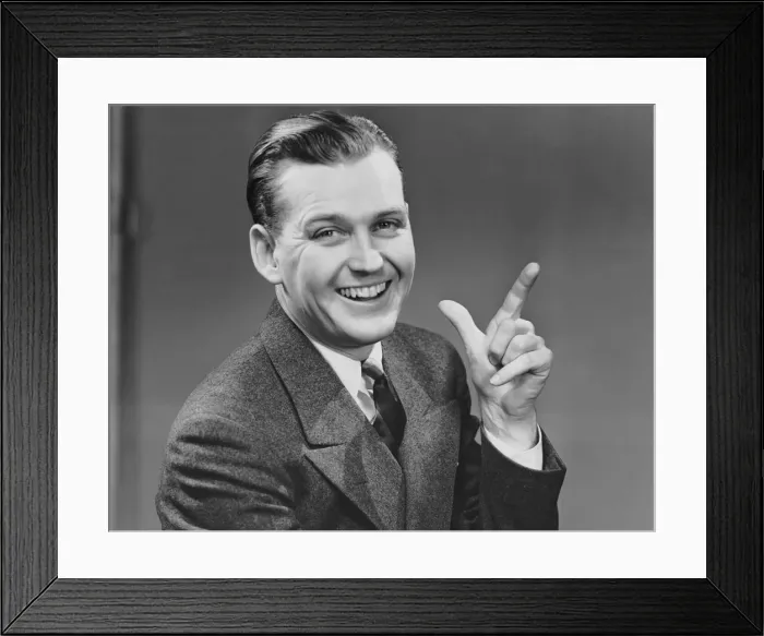 Framed Print : Executive smiling and gesturing Framed Print : Executive smiling and gesturing
