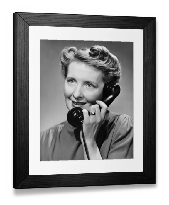 Framed Print : Woman talking on telephone