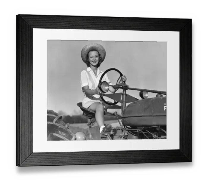Framed Print : Woman on tractor Framed Print : Woman on tractor
